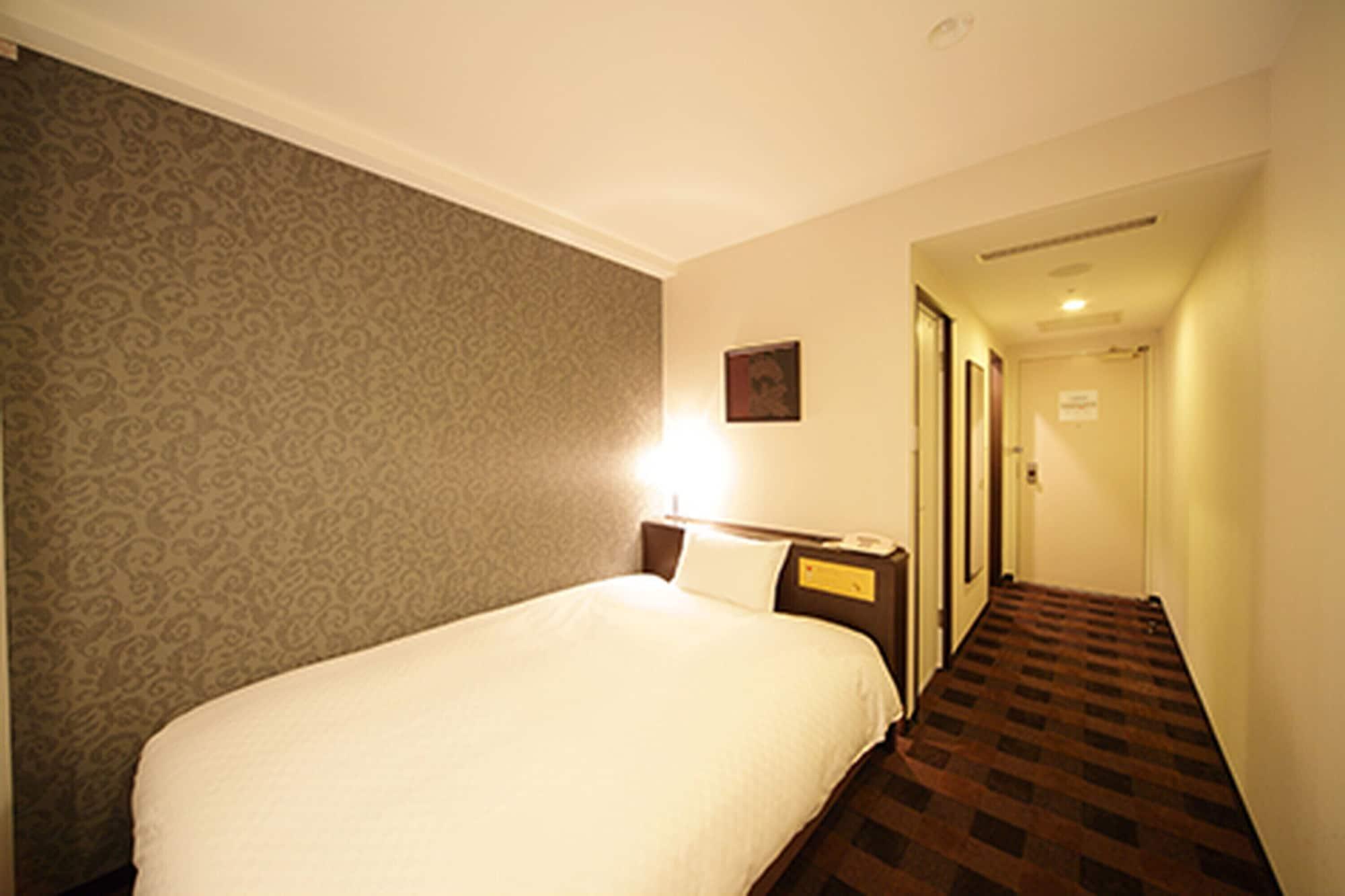 Hotel Granvia Wakayama Exteriör bild A single room at a hotel in Japan