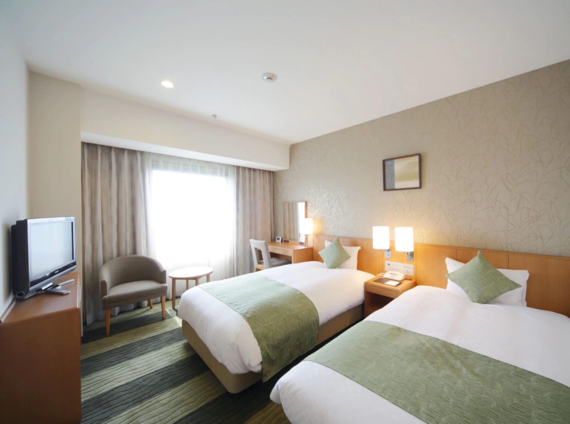Hotel Granvia Wakayama Exteriör bild A room at the hotel