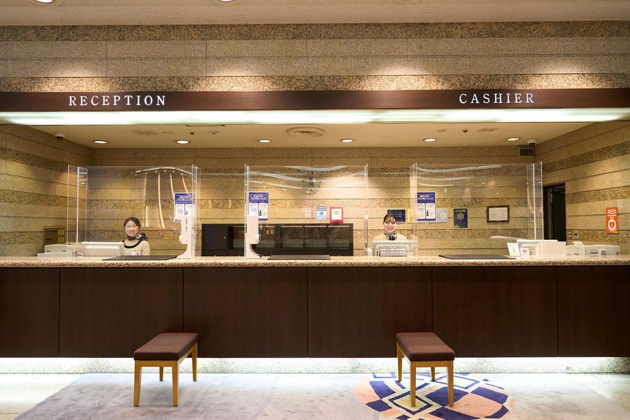 Hotel Granvia Wakayama Exteriör bild Reception desk at a hotel