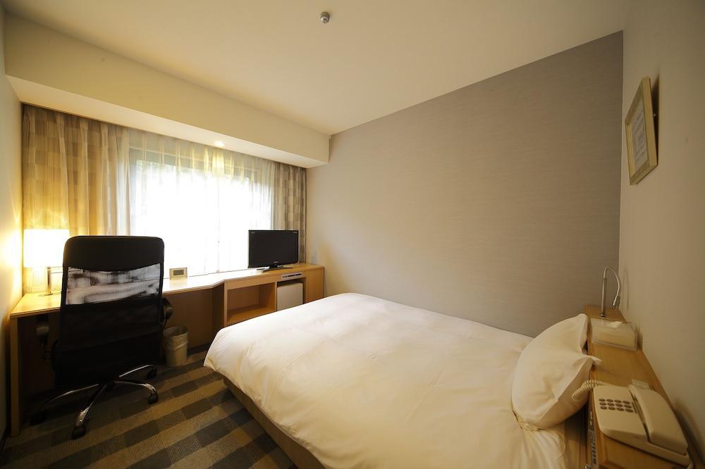 Hotel Granvia Wakayama Exteriör bild A single room at the hotel