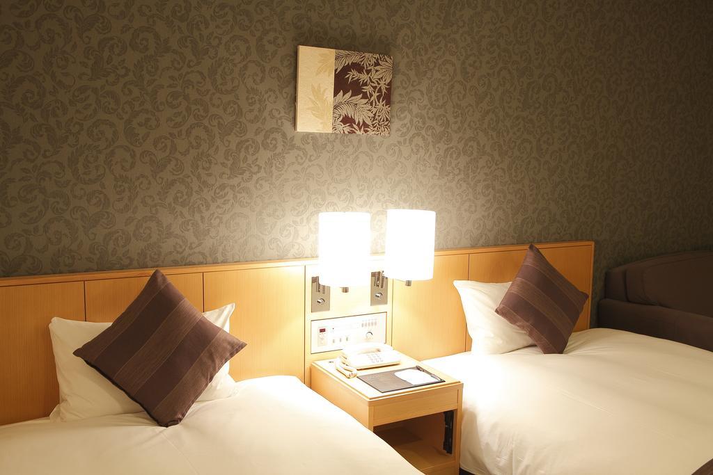 Hotel Granvia Wakayama Exteriör bild A room at the hotel