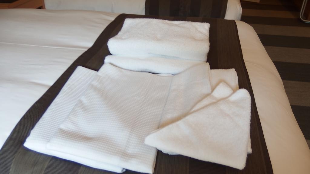 Hotel Granvia Wakayama Rum bild Bath towels