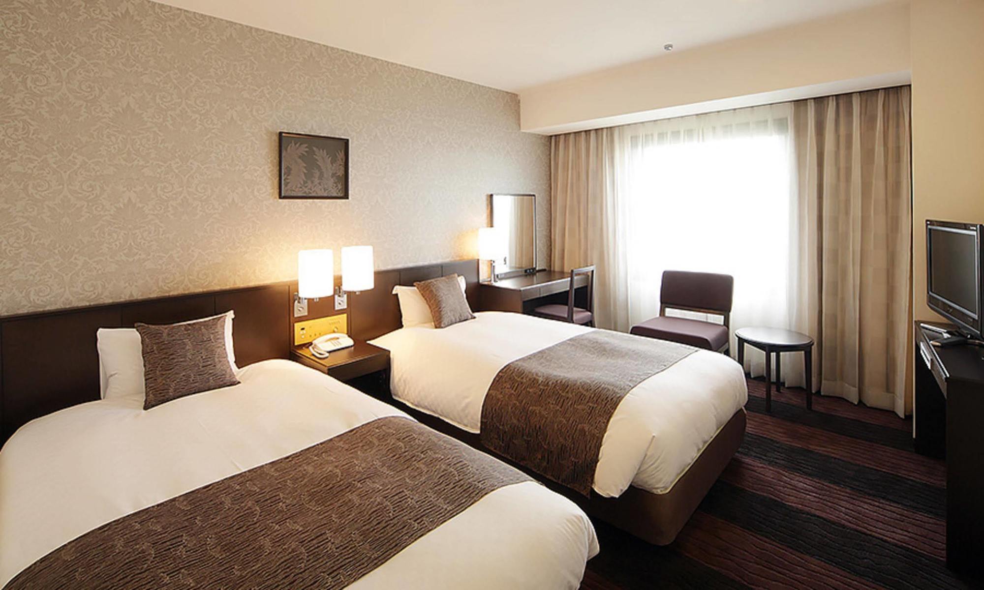 Hotel Granvia Wakayama Exteriör bild A room at the hotel